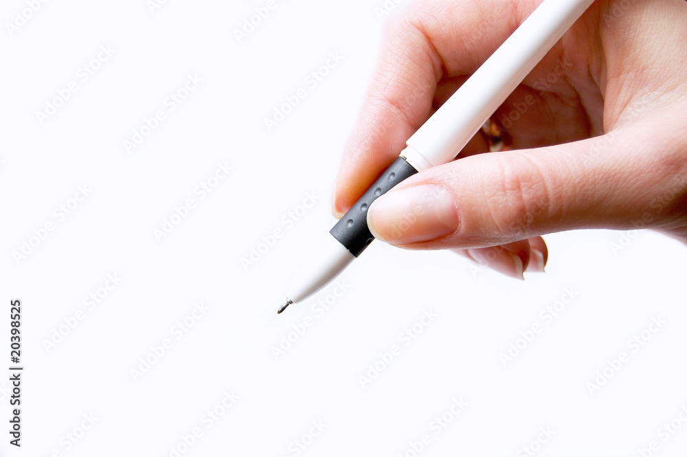 Hand of the person with the writing handle Hand of the person with the writing handle