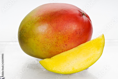 One whole mango and one mango slice