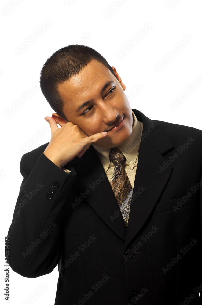Young businessman using a call me gesture Young businessman using a call me gesture