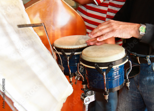 Cuban musician playing pongo drum