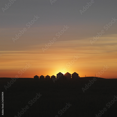 Row of Houses Silhouetted at Sunset