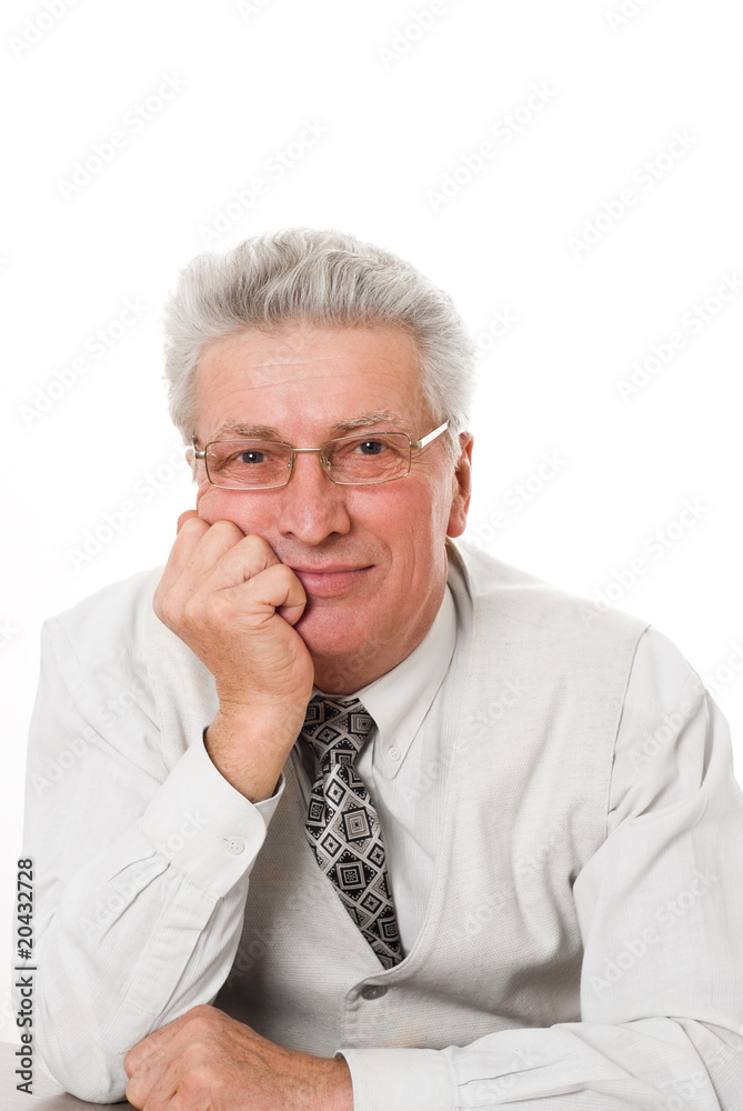 businessman sitting pensively against a white background businessman sitting pensively against a white background