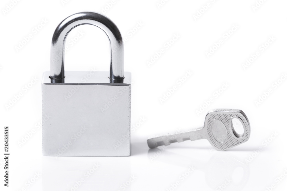 Lock and key on the white background Lock and key on the white background