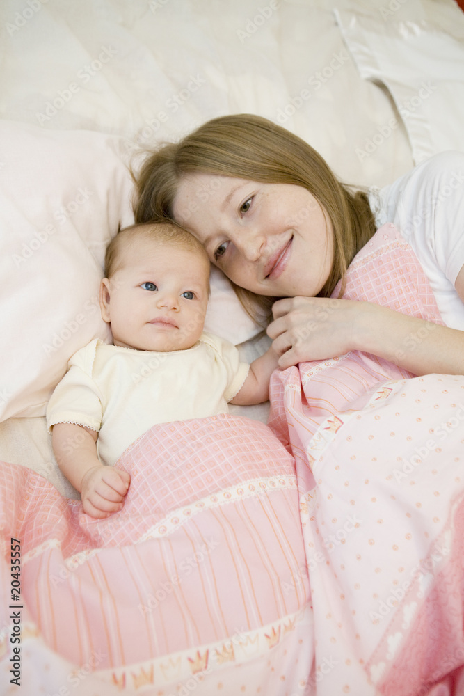 Beautiful Mother and her bay lying together Beautiful Mother and her bay lying together