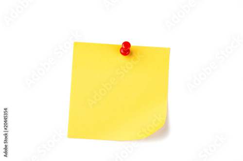 yellow note paper with red pin