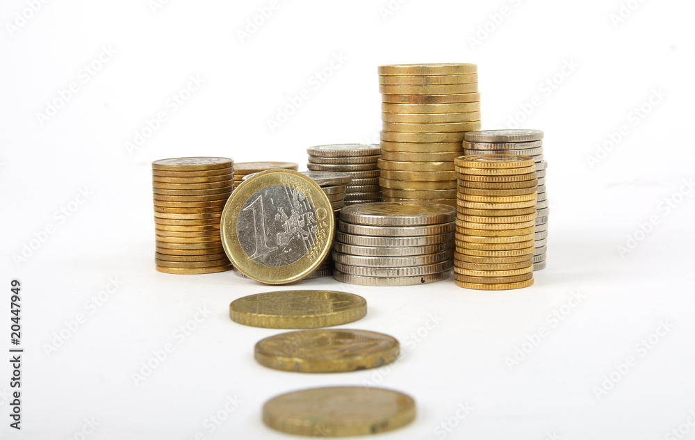 Piles of coins isolated on white background Piles of coins isolated on white background