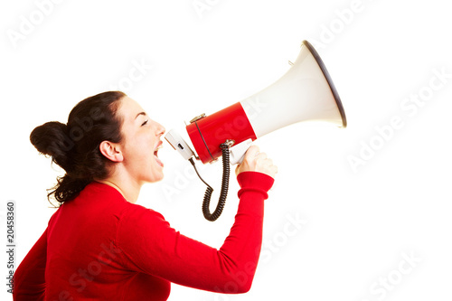 Woman using a megaphone photo