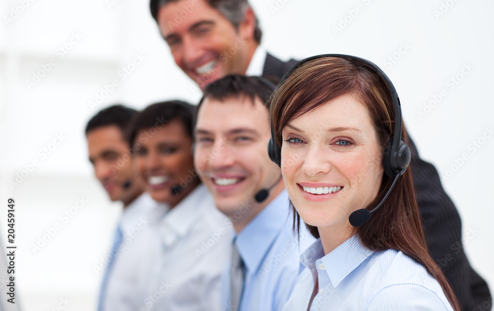 Positive business people working in a call center Positive business people working in a call center