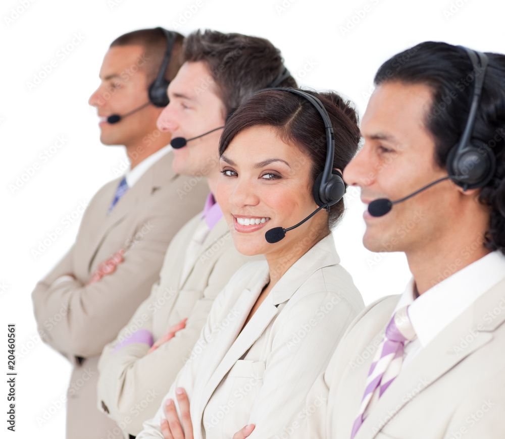 Assertive customer service representatives standing in a row Assertive customer service representatives standing in a row