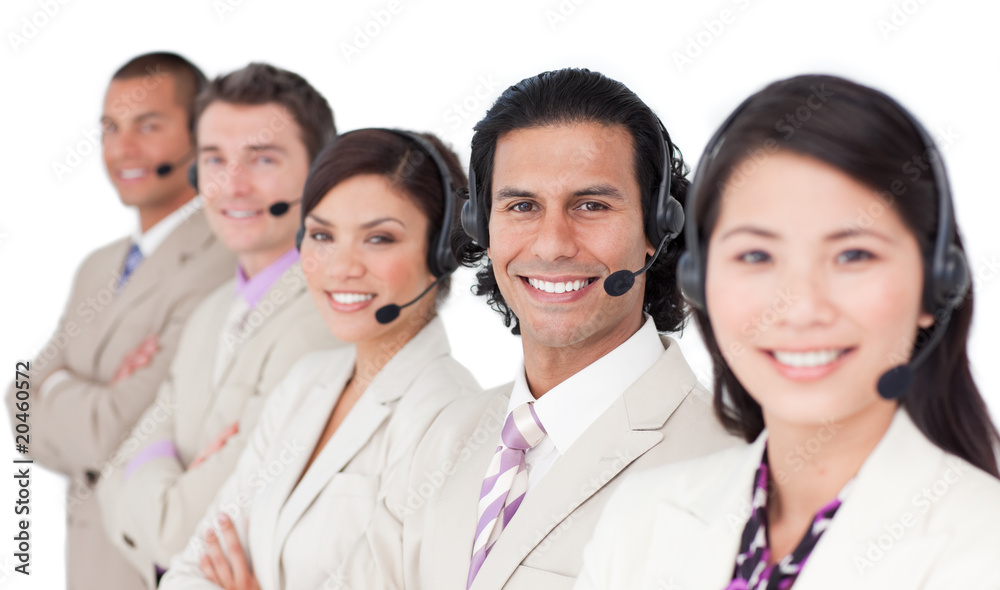 Young customer service representatives standing in a row Young customer service representatives standing in a row