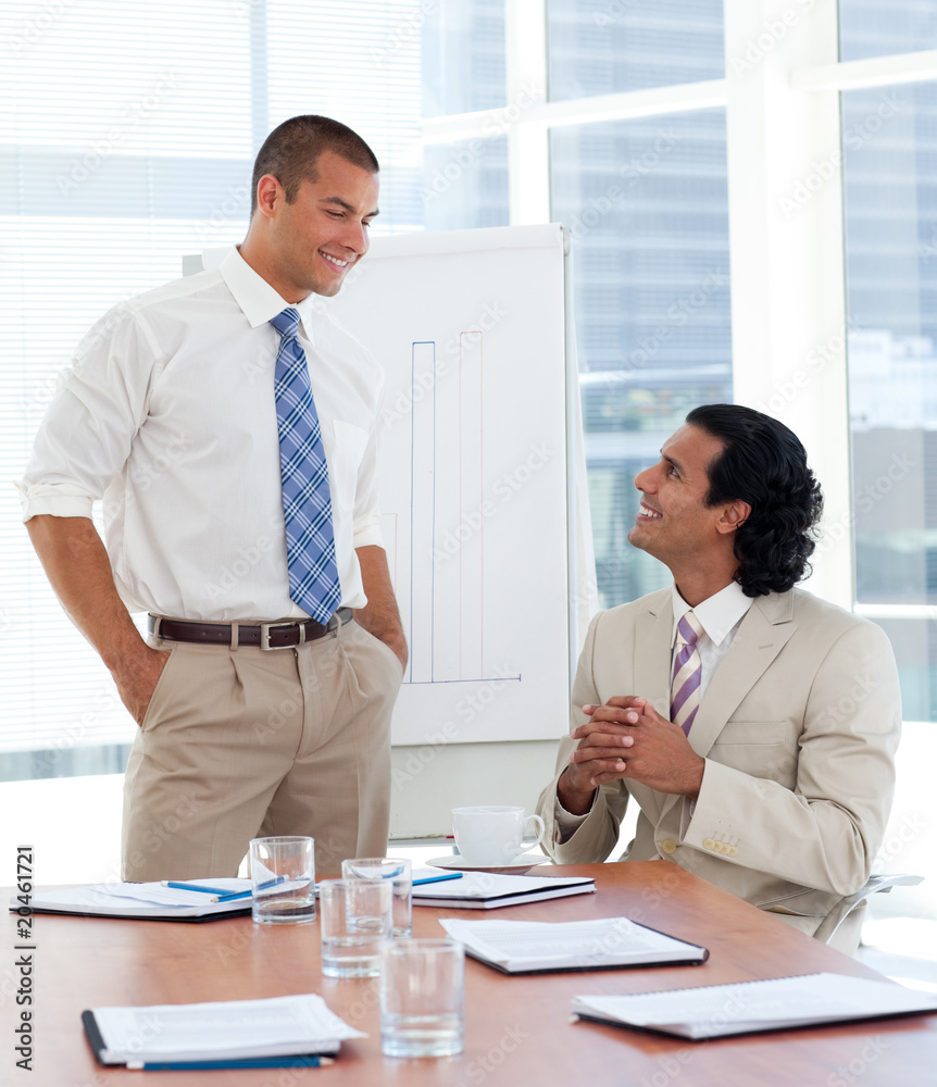 Self-assured businessman giving a presentation Self-assured businessman giving a presentation