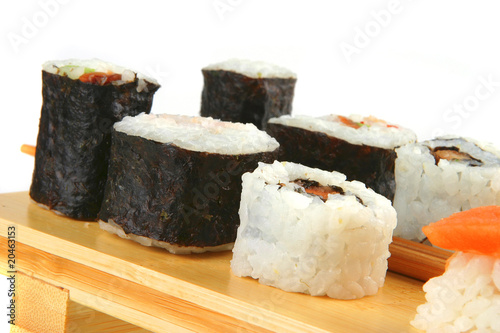 maki and sashimi sushi on plate