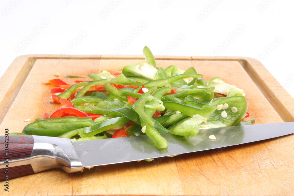 Cooking plank with Ggreen and red bell pepper Cooking plank with Ggreen and red bell pepper