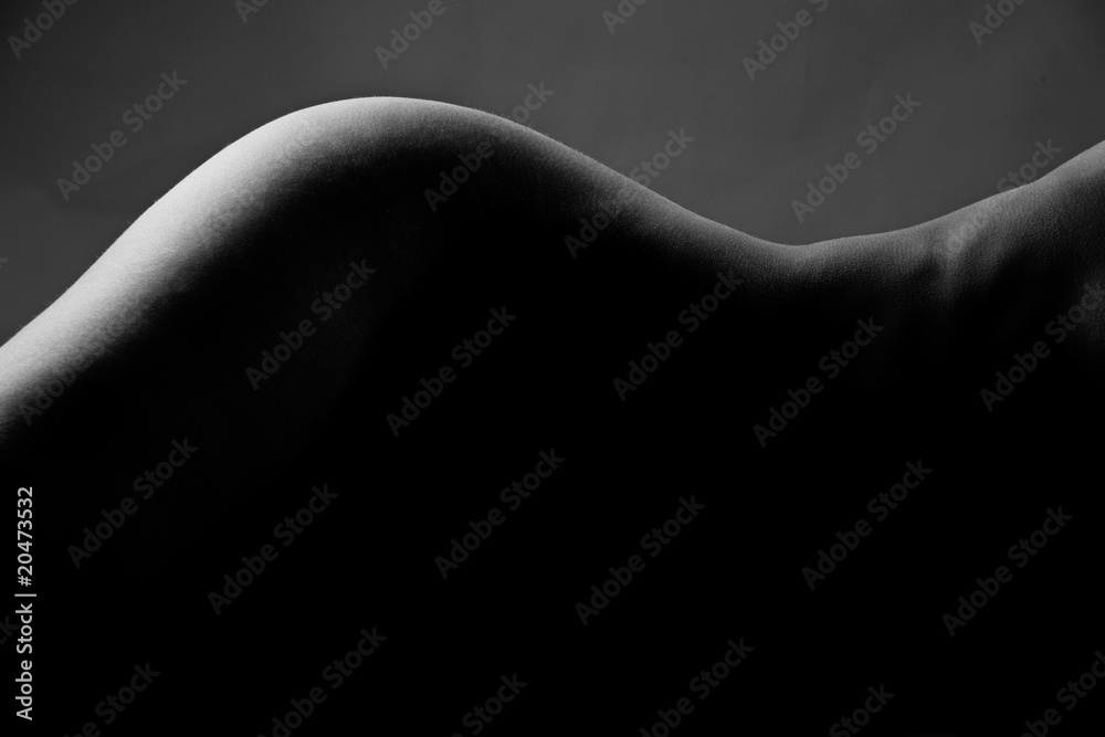 Line of a hip of the young woman Line of a hip of the young woman