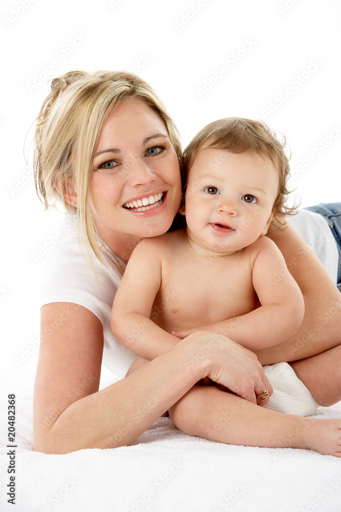 Studio Portrait Of Mother With Young Baby Boy Studio Portrait Of Mother With Young Baby Boy