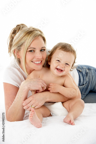 Studio Portrait Of Mother With Young Baby Boy