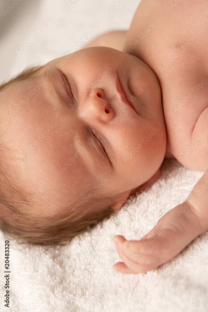 Close Up Of Baby Sleeping On Towel Close Up Of Baby Sleeping On Towel