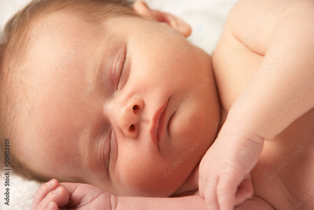 Close Up Of Baby Sleeping On Towel Close Up Of Baby Sleeping On Towel