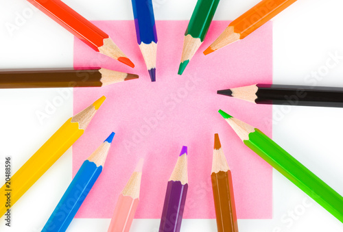 Multicolored pencils and paper