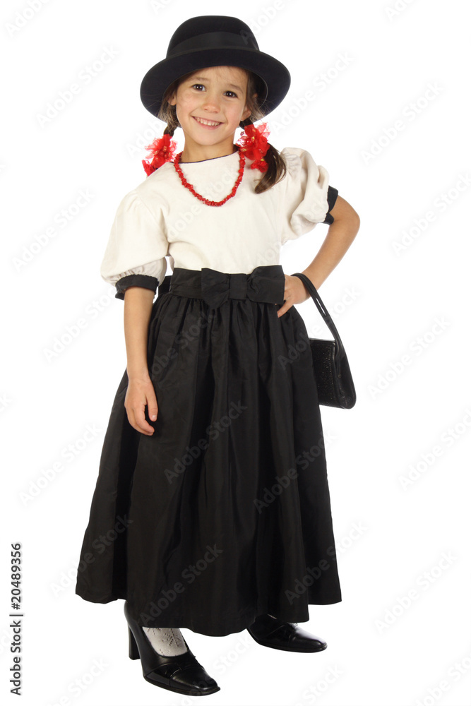 Smiling little girl with big hat and red beads