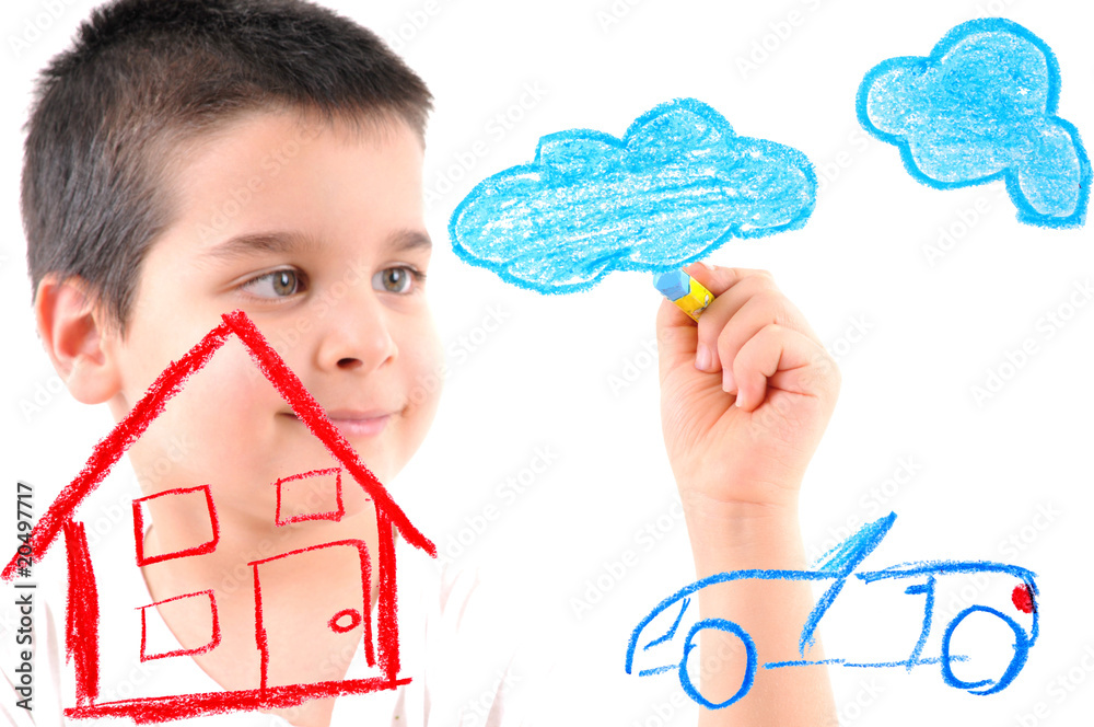 Obraz premium Adorable 6 years old boy painting a house on glass.