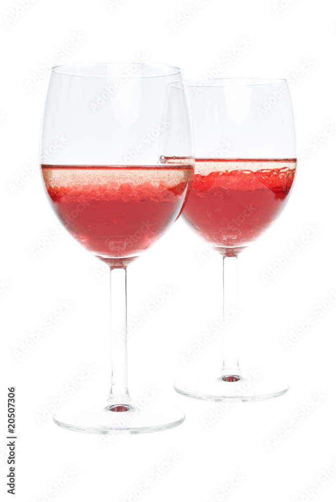 twoglass with colored red liquid on a white background twoglass with colored red liquid on a white background