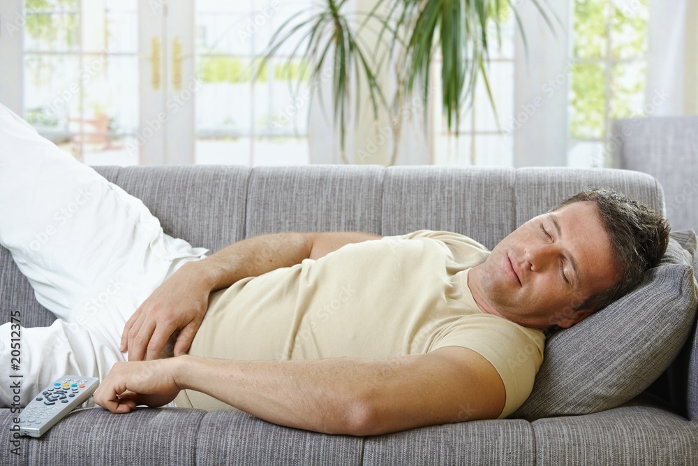Man sleeping on sofa Man sleeping on sofa