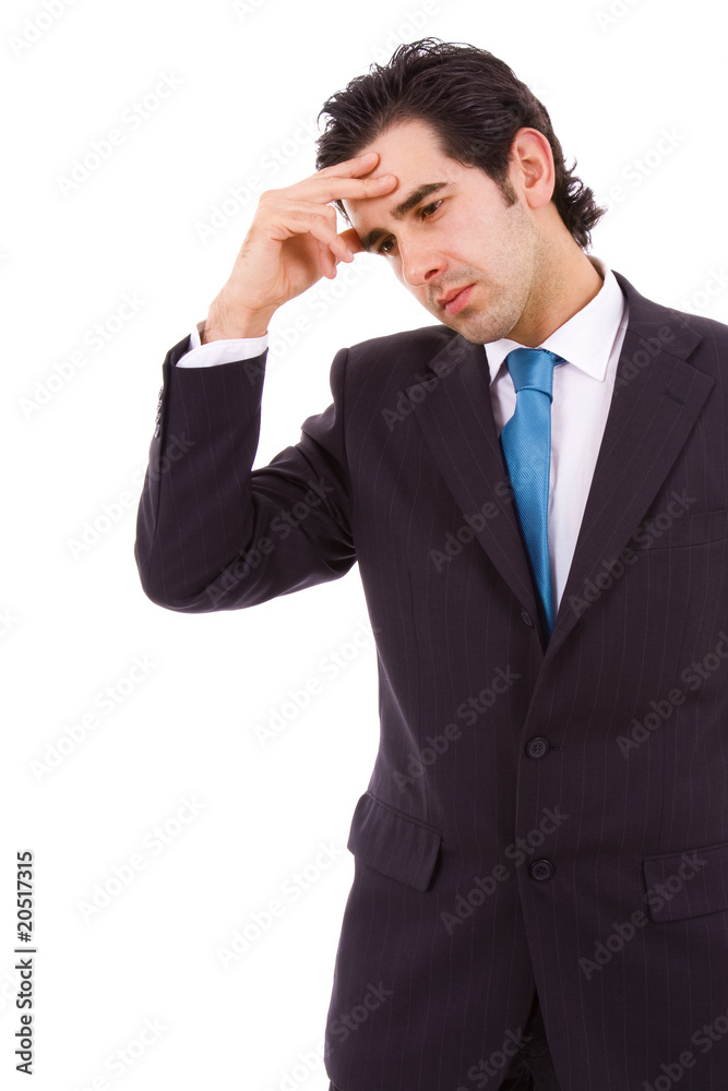 Businessman in a suit gestures with a headache, isolated on whit Businessman in a suit gestures with a headache, isolated on whit