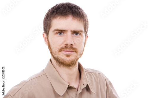 Close-up portrait of a handsome young man, isolated on white bac