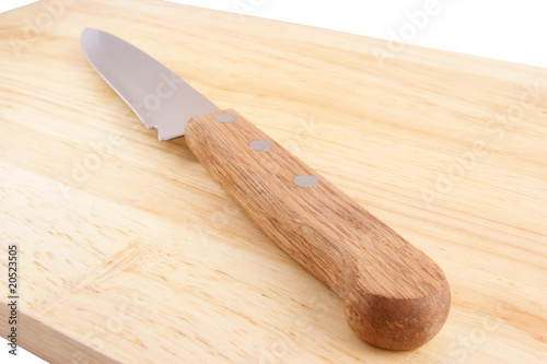 Knife on the chopping board isolated