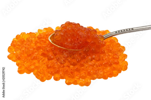 Red caviar in spoon isolated white background