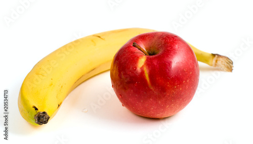 yellow banana and ripe red apple
