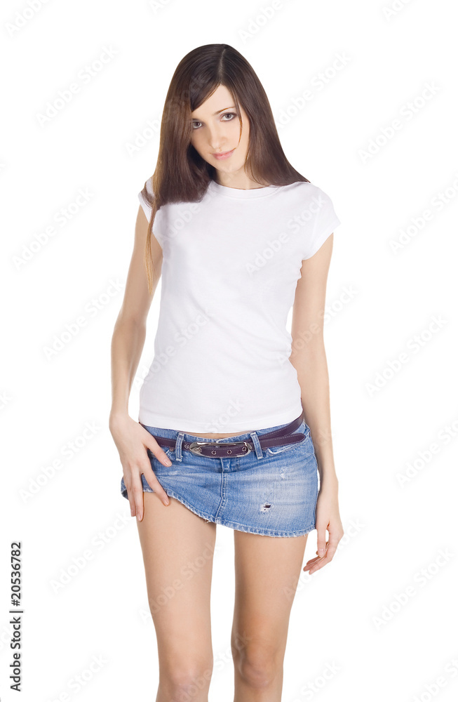 Obraz premium Lovely brunette in denim skirt