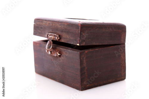 Old wooden box of treasure isolated on white background