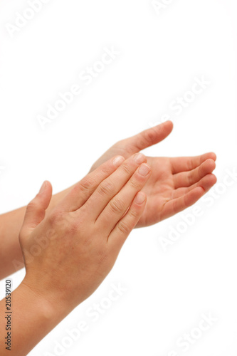 Hurra! Human hands clapping on white