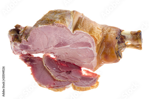Fotografi Cutting pork gammon on a bone on white