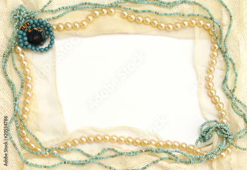 Frame of lace and jewelry: turquoise, pearls, coral