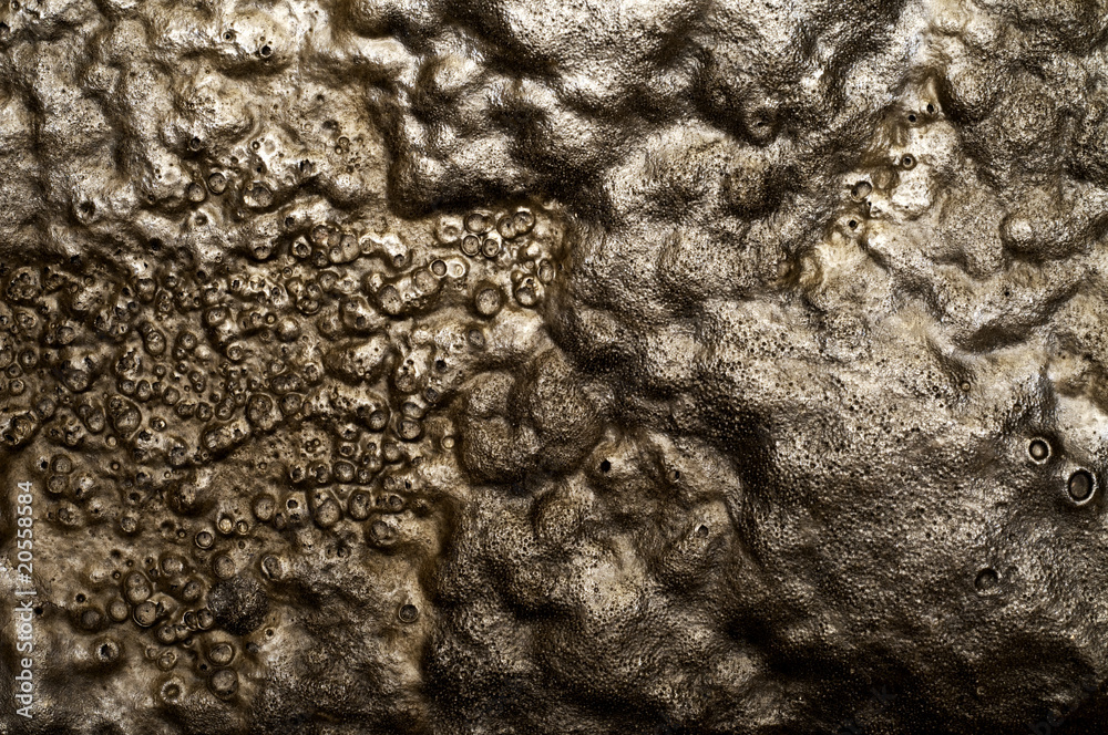 Melted, bubbled rubber surface, excellent for background