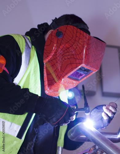 Construction worker welding