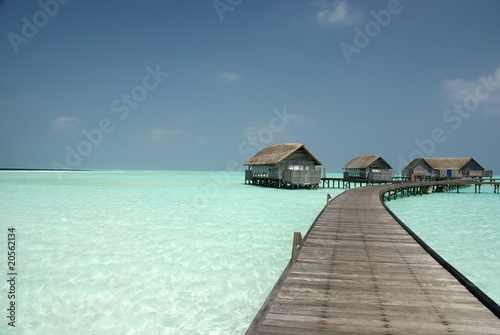 Fototapeta Naklejka Na Ścianę i Meble -  Overwater Villas in a Maldivian lagoon