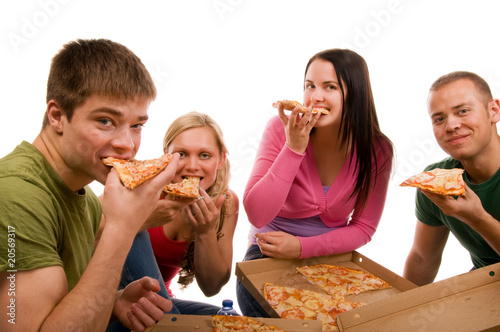 Friends having fun and eating pizza
