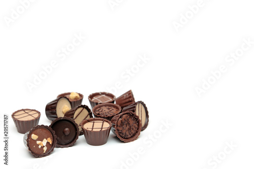 Mixed Chocolates on white with copy space