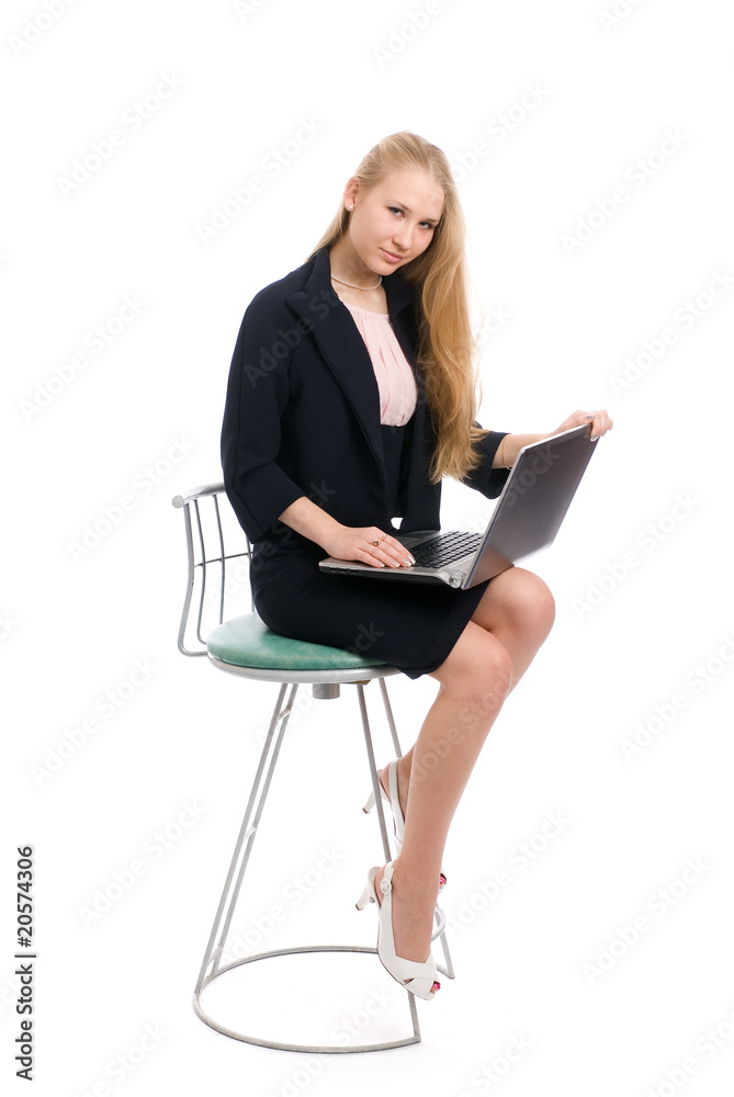 young blond business woman sitting with laptop young blond business woman sitting with laptop
