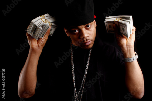 Photography young black male with bundles of cash