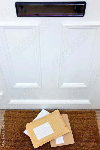 Fotografie Letters on the doormat