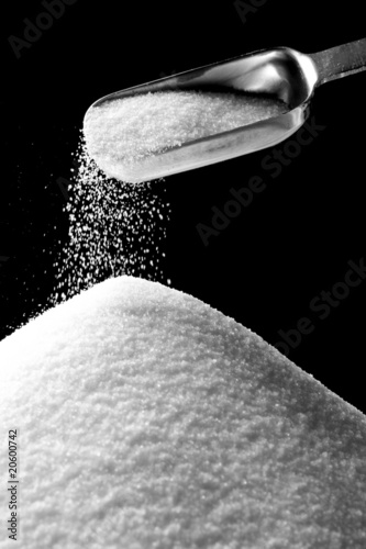 Sugar Falling from Tablespoon