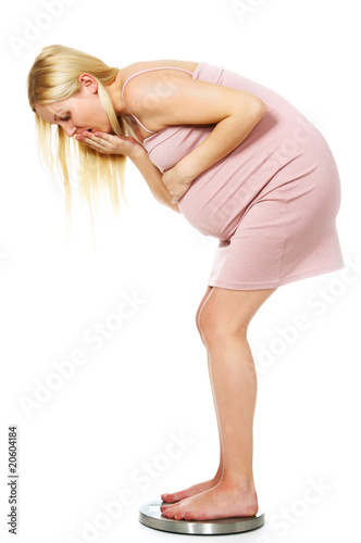 pregnant woman on the scales