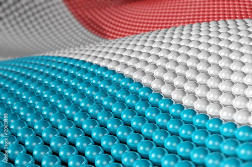 Wave of spheres in the colors of Luxembourg