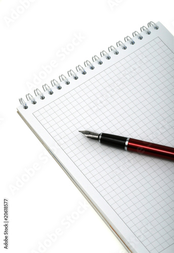 Pen and notebook for notes on a white background. Isolated