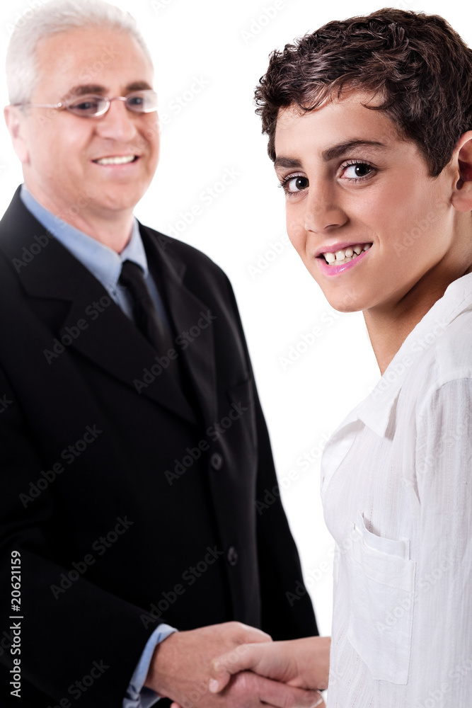 Business man handshake with a young boy Business man handshake with a young boy